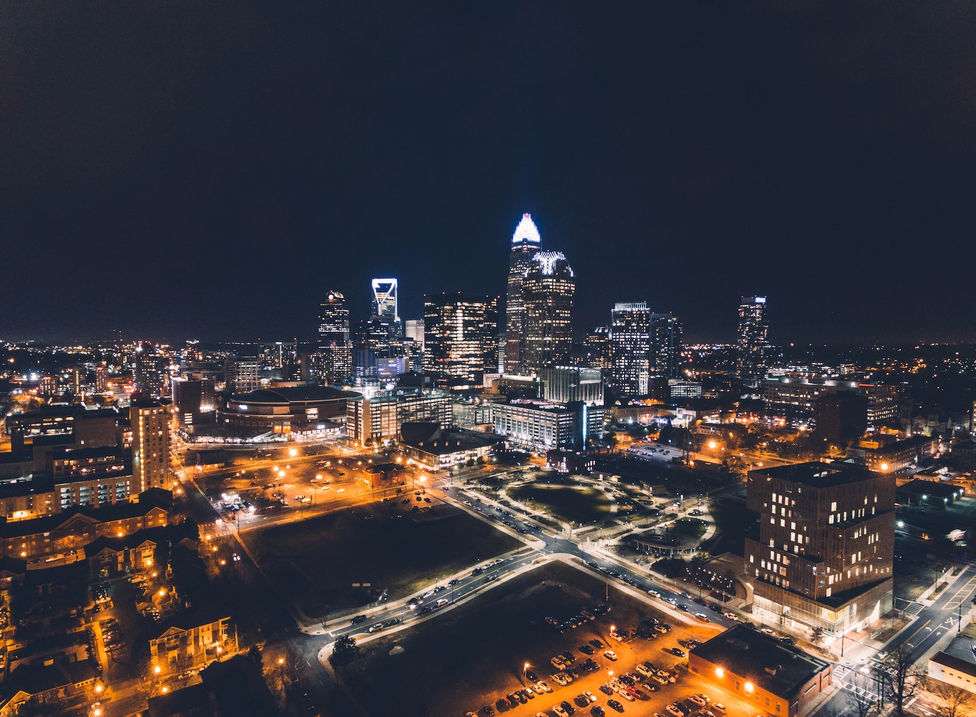 Commercial office buildings lit up at night in Downtown Charlotte, North Carolina