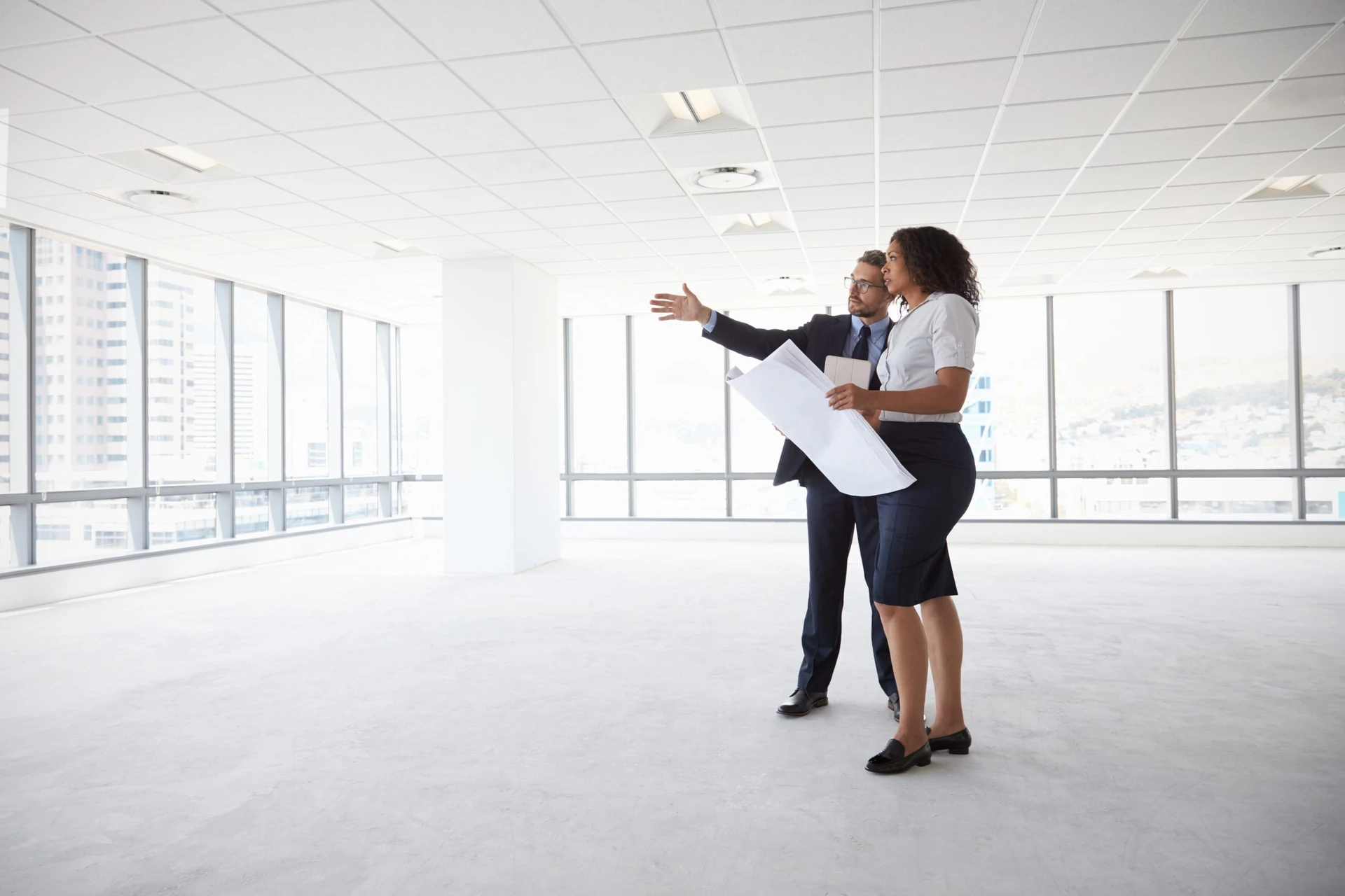 Commercial Real Estate CRE SIOR Agent Presenting Open Office Space in Charlotte, NC