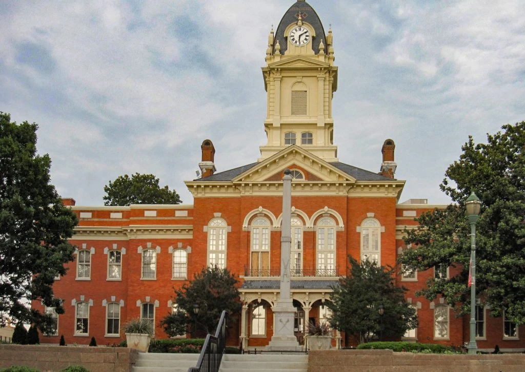 Skyscrapers with reflecting walls in modern megapolis: real estate is still a safe investment. Find a perfect option with a SIOR certified realtor