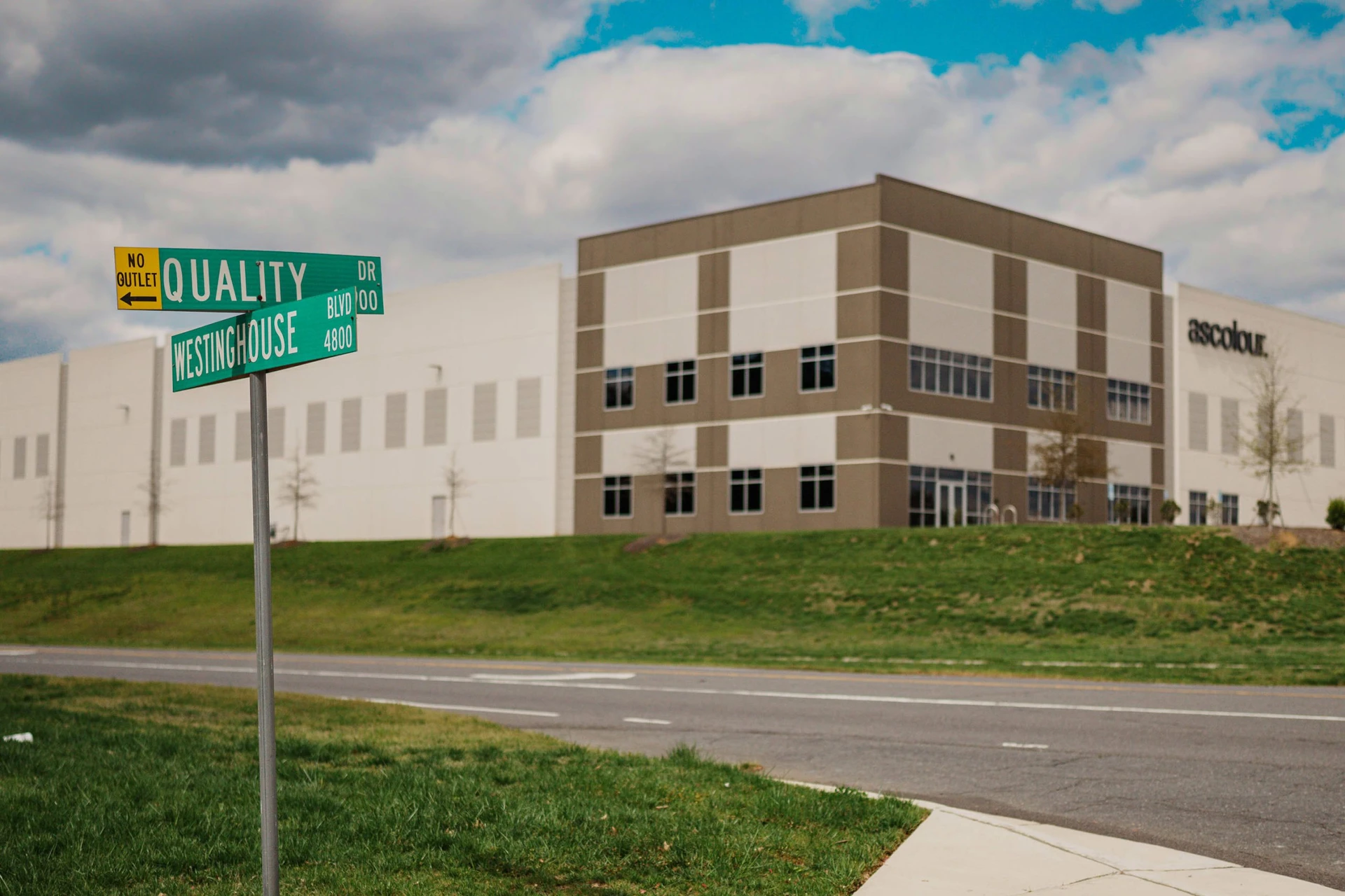 Skyscrapers with reflecting walls in modern megapolis: real estate is still a safe investment. Find a perfect option with a SIOR certified realtor