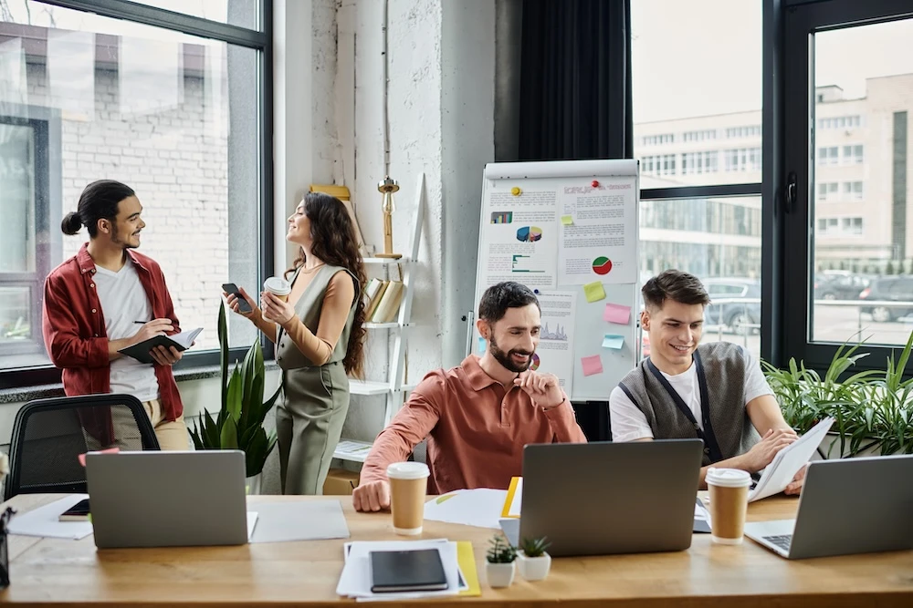 team members in hybrid office with natural light